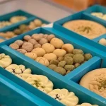 سوغاتیهای کرمان: راهنمای کامل خرید شیرینی، صنایع دستی و خوراکیهای اصیل